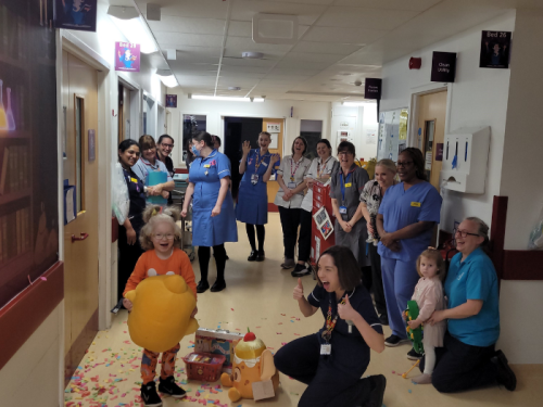 Nicol with the nurses on her ward, celebrating and looking happy
